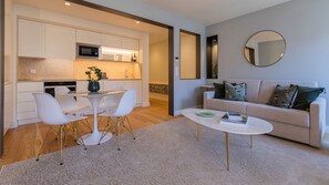 Living room and fully equiped kitchen