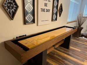 Try your hand at shuffleboard while enjoying fun-filled evenings with friend