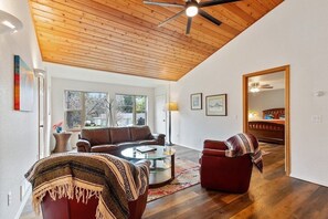 : Embrace the mountain vibes in this bright space with stunning wood accents!