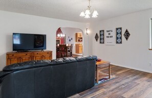 Unwind with fun movies or vibrant game nights in this inviting space!
