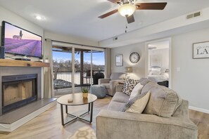 Spacious living room w amazing sunsets.  TV has cable and streaming capabilities