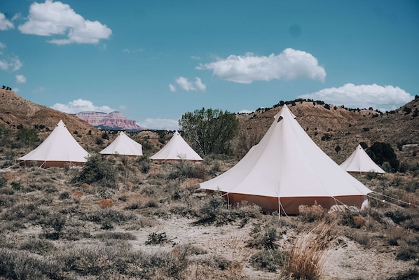 A view of our bell tents with the mountains in the distance at our Bryce Canyon location.