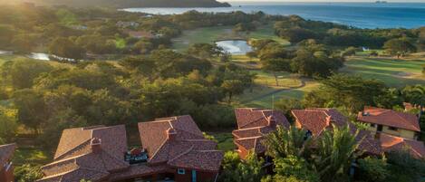 Bougainvillea Condominiums in Reserva Conchal overlook golf course and ocean.