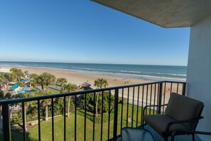 Large balcony accessible from the living room, kitchen, and master bedroom.