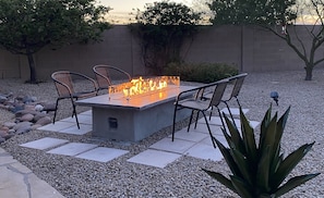 Relax by newly added gas-plumbed fire table - built with guests in mind!
