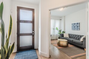 Quiet home office with a desk and comfy couch
