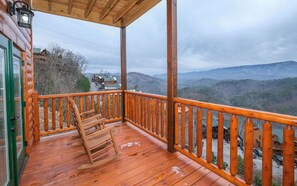 Breathe in fresh mountain air while relaxing on the private deck!