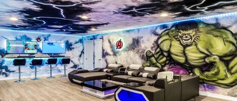 Themed Loft: Immerse in Marvel magic with multiple TVs and a bar, creating an entertainment hub for a stylish and fun-filled experience