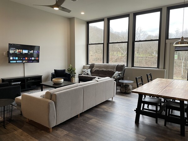 Living area with large screen smart TV