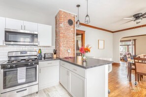 The kitchen is devine. Brand new stainless steel gas oven/stove, microwave & toaster.