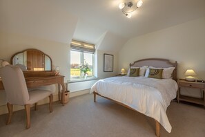 Saltings House, Ringstead: Master bedroom with views across the fields