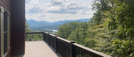 Wrap around deck offers views ... babbling creek is just off the side deck. 