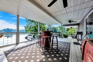 Large porch to accommodate everyone. Large fans to keep you cool during the day.
