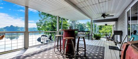 Large porch to accommodate everyone. Large fans to keep you cool during the day.