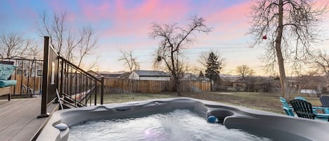 Relax in the gorgeous hot tub with mountain views!
