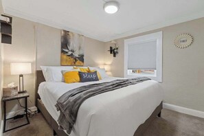 The main bedroom has a King sized bed. 