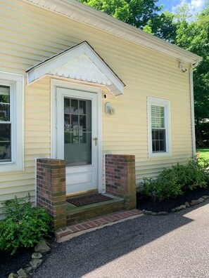 Side entrance off the driveway with keyless entry you’ll use for check-in. 