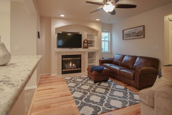 Cozy up by the fire in the Family Room