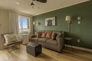 The cozy living room is a great place to relax and the sleeper sofa has sleeping capacity for two people.  (Enjoy the six inch memory foam mattress in the sleeper sofa!)