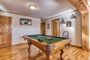 Pool Table / Game room with fireplace