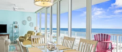 Seat six at the dining room table with gorgeous wall to wall, floor to ceiling ocean views!