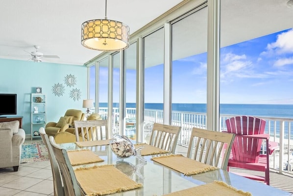 Seat six at the dining room table with gorgeous wall to wall, floor to ceiling ocean views!