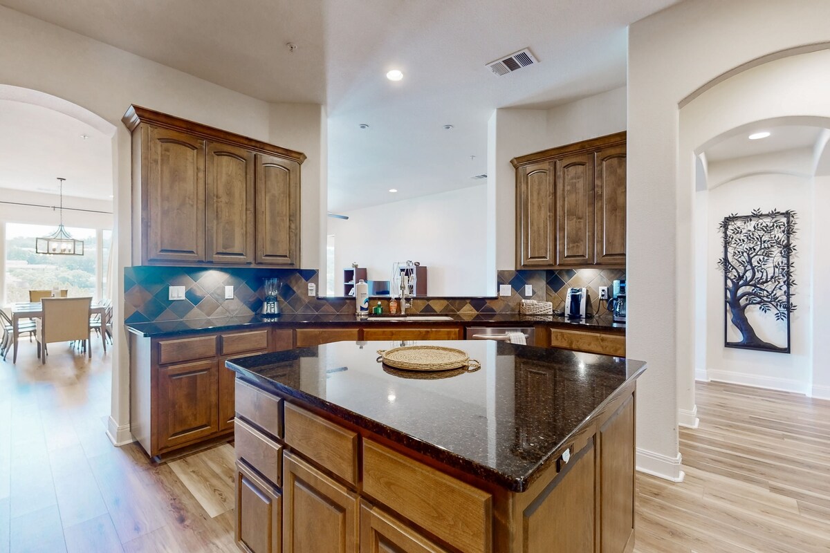 Lake-view condo with balcony in resort community — on-site spa, bar, & dining