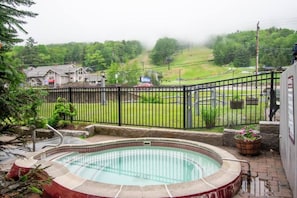 Hot tub overlooking the slopes at Attitash Mountain