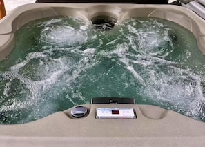 Soak in the brand new hot tub while enjoying nature