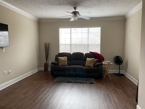 Spacious living room for morning yoga/exercise. 