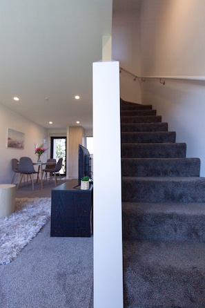 Ground floor, stairs leading up to 2nd floor with bedrooms and bathroom