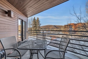 Enjoy the fresh mountain air from the private balcony where you will find four outdoor chairs to relax in while you take in the mountain views.