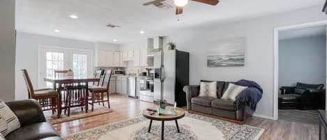 Living room with view of the dining area