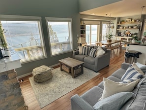 Living room flowing into the kitchen and dining area