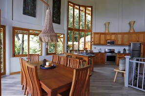 Dining Room Area with table & chairs hand-crafted by Maura's brother