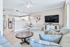 Smart TV in the living area allows you to watch all your favorites. 