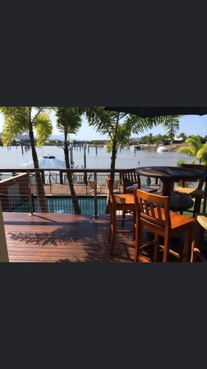 outdoor deck overlooking private pool