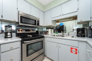 Kitchen equipped with all appliances, everything you need for preparing meals.