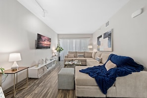 Cozy, bright living room with stylish decor – perfect for unwinding!