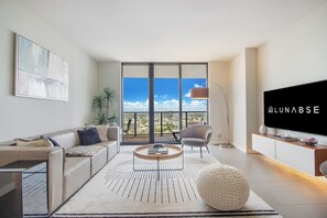 Living Room: Sit back and enjoy the city and bay view from the spacious living room.