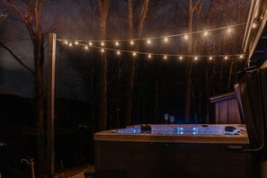 Spa/ Hot Tub area at night with lights