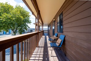 Enjoy the chairs and view from the front of the condo patio. 