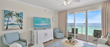 This 3BR/3 BA updated condo features a bright and open living and dining space with tall ceiling, Gulf views, and plenty of seating around a large Smart TV for all your streaming needs.