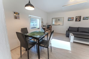 Dining area with living room.