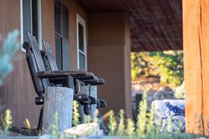 Comfy rustic rockers on west facing porch for beautiful sunsets.