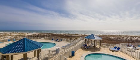 Beautiful view of the beach and pools from the sundeck