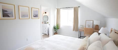 Windows in the bedroom and large en-suite bathroom provide uplifting natural light.