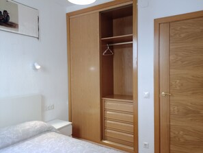 2nd bedroom with air conditioning and built-in wardrobe