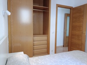 2nd bedroom with air conditioning and built-in wardrobe