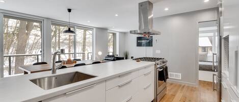 This modern tiny house kitchen has everything you need!